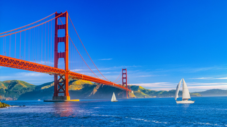 Sailboats sailing under the Golden Gate Bridge in the San Francisco Bay