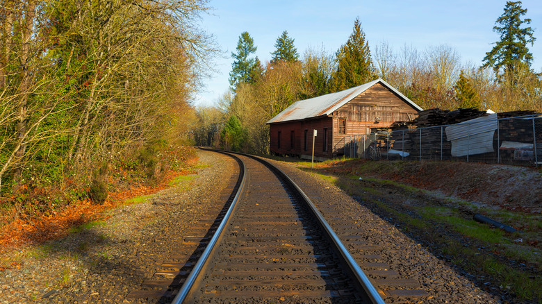 Railroad tracks and barn outside of Aurora, Oregon