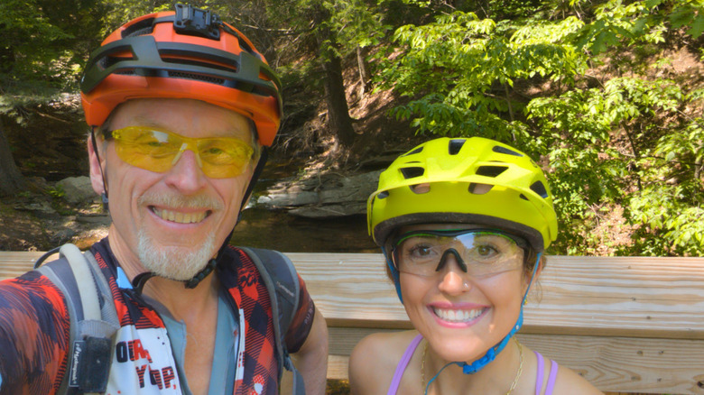 Author Gentry Hale and biking guide Dan Dalquist smiling while on the Maasto Hiihto Trail