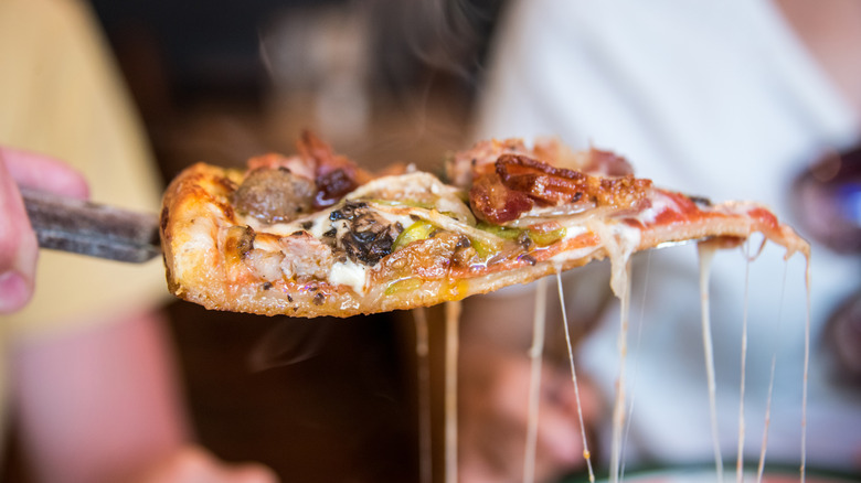 A slice of thin crust Connecticut pizza