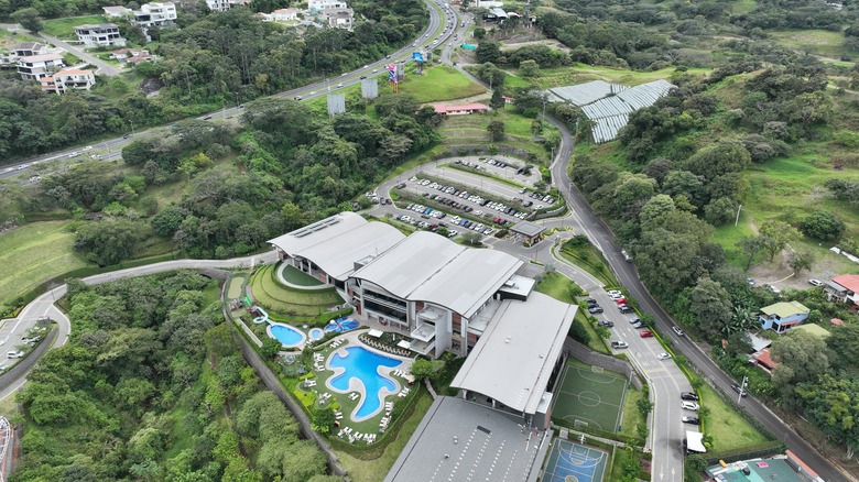 Aerial view of Santa Ana, Costa Rica, surrounded by lush forest