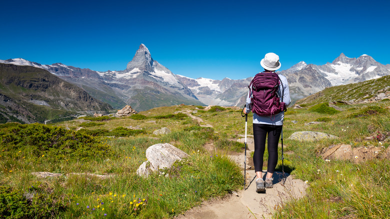 Woman hiking on the Swiss Alps