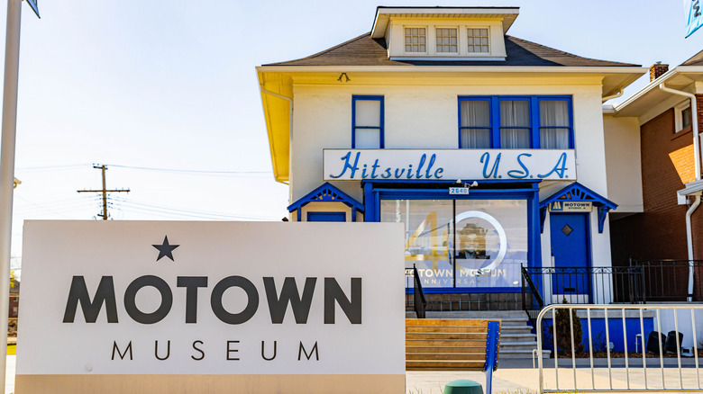 The blue-and-white Motown Museum building with a sign out front.