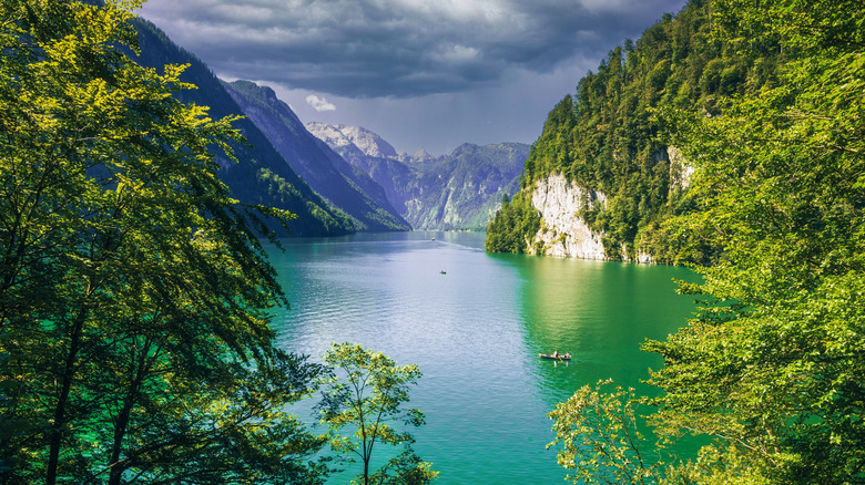 High mountains loom above the clear waters of the Königssee