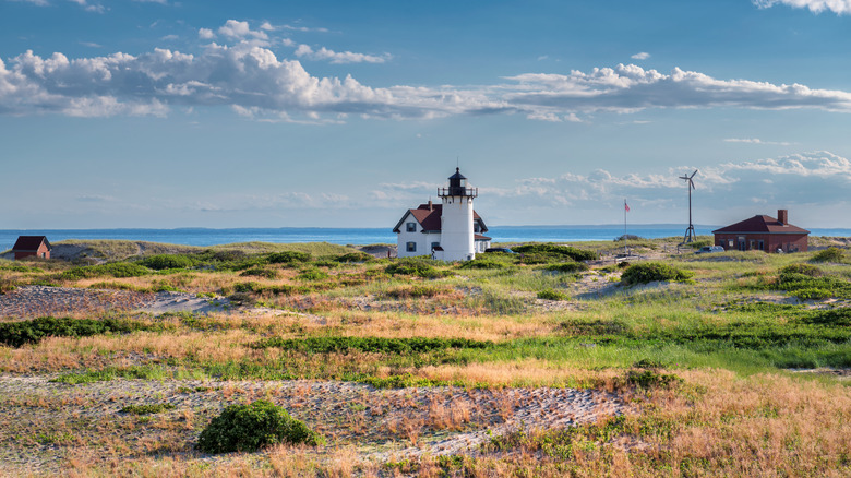 Race Point Lighthouse surrounded by sand dunes in Cape Cod, Massachusetts