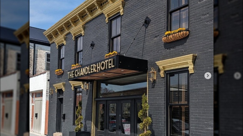 The black and gold facade of the Chandler Hotel in Madison, Indiana