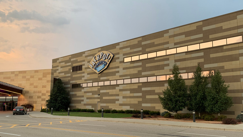 Exterior of Jackpot Junction casino at sunset.