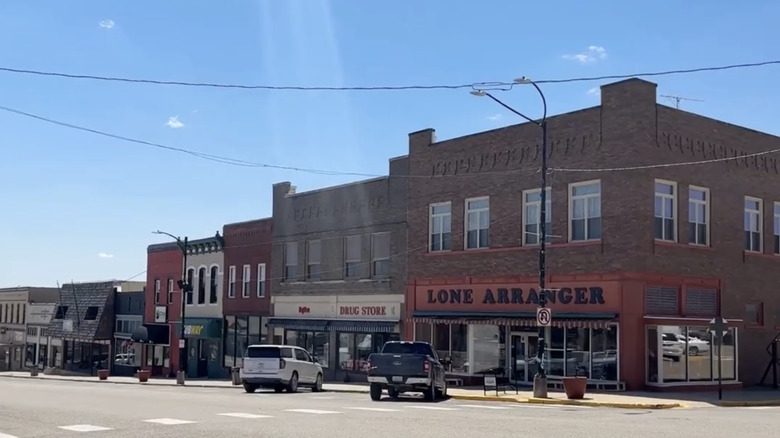 blue sky over brick buildings on street
