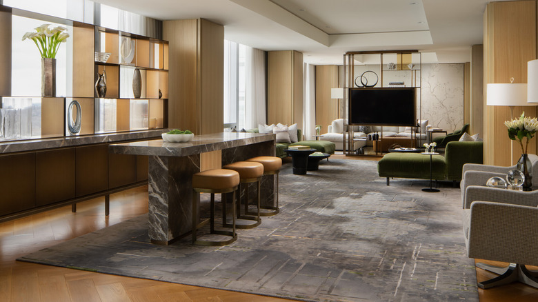 A view of the posh living room with the skyline view from the Royal Suite at Four Seasons Hotel in Toronto