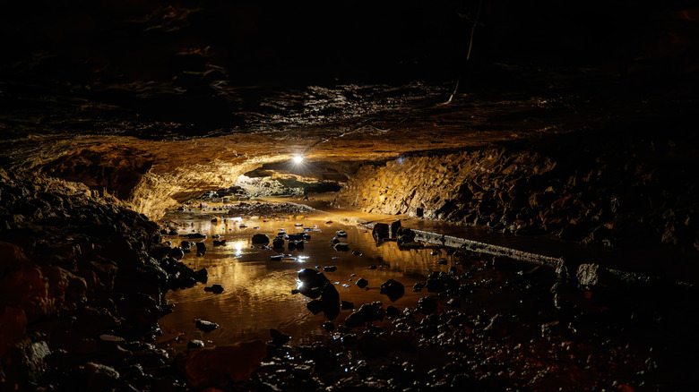The underground cave with water reflection in Maquoketa Caves State Park, Iowa, USA