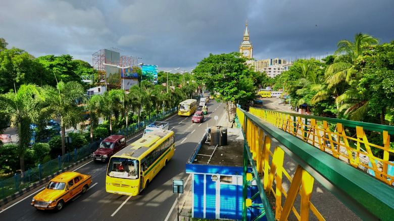 Buses and taxis travelling through Kolkata, India