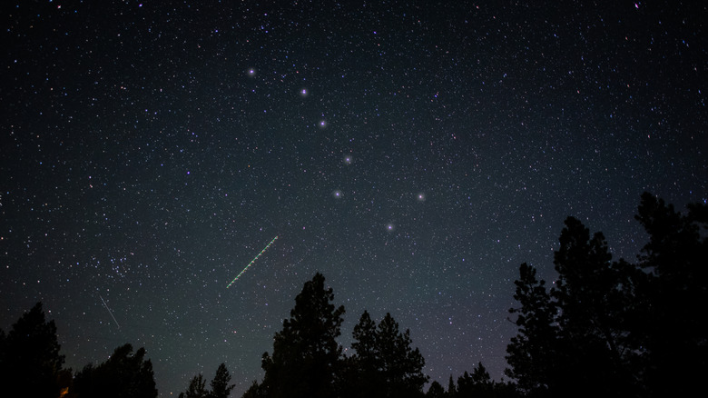 The big dipper constellation with meteor