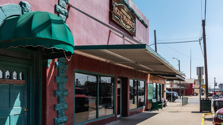 City Market building and sidewalk in Luling, Texas