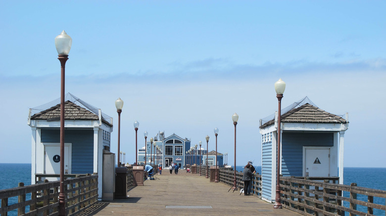 picture of Oceanside Pier with bait shop near background