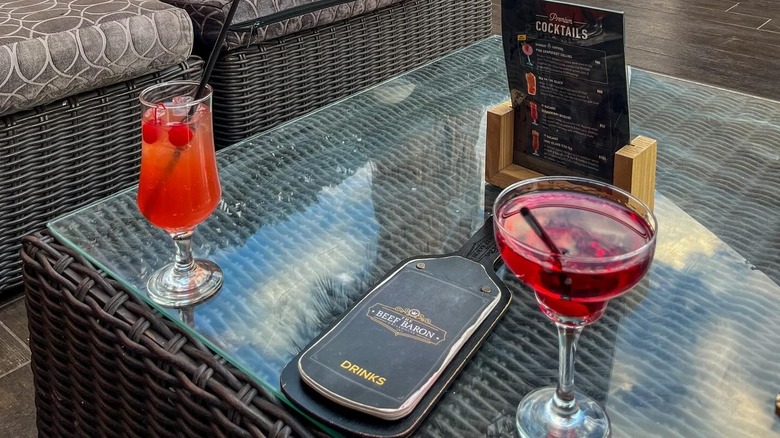 Cocktails on the patio at The Beef Baron Grillhouse in the Rio Casino & Resort.