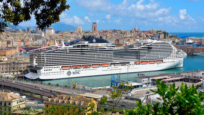MSC World Europa cruise ship docked near a European city