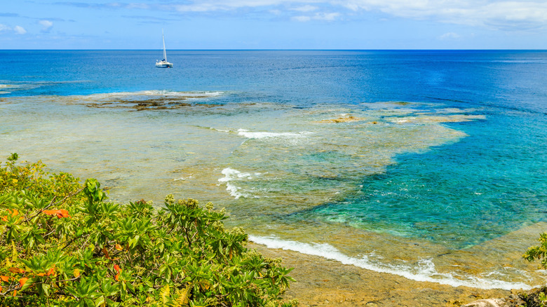 Sailing yacht anchored off the shore of Niue