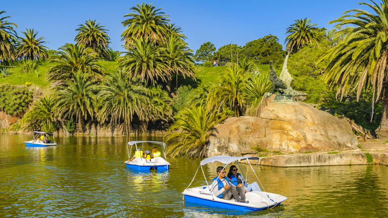 Paddleboaters on the water at Parque Rodó in Montevideo, Uruguay