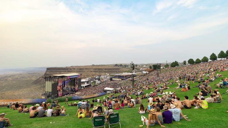 Audience members enjoy a concert on the lawn at the Gorge Amphitheater