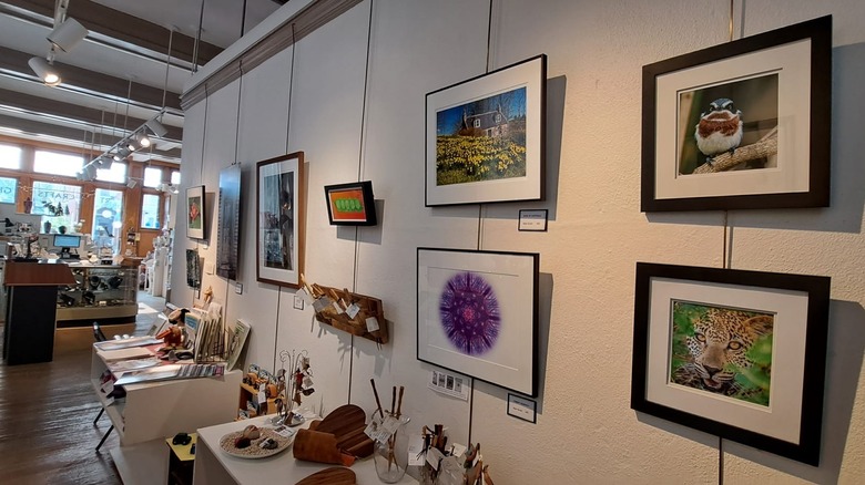 Wall full of art displayed at the Gallery at the VAULT