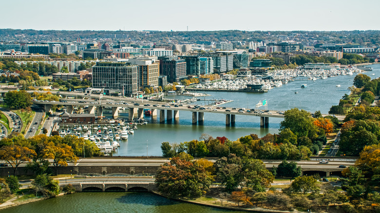 Aerial view of Washington D.C. city and river during summer.