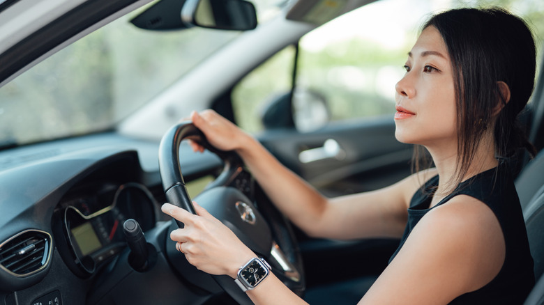 Woman driving car