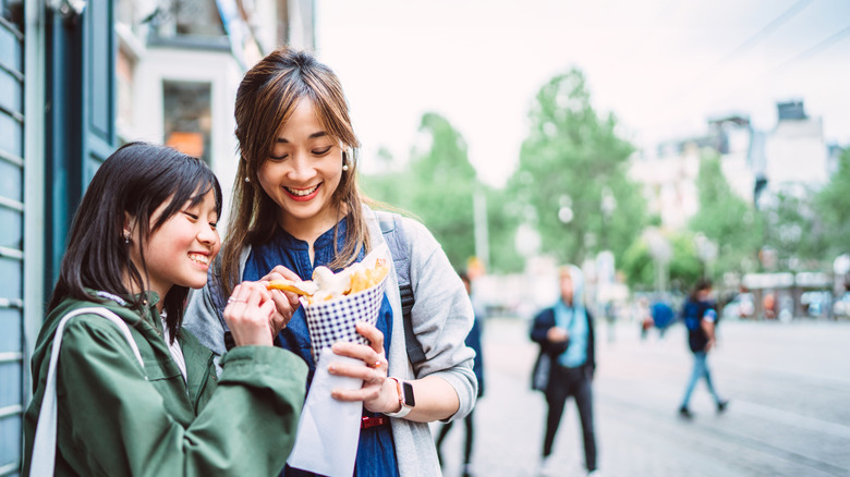 Eating fries in Amsterdam
