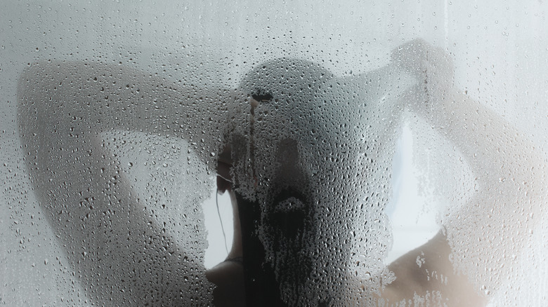 silhouette in shower fog 
