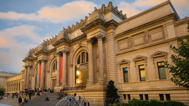 The stately facade of the Metropolitan Museum of Art in New York City at sunset