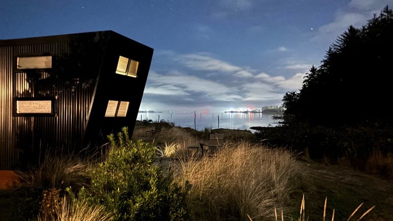 A view of a modernist structure on the beach at Bay Point Landing on the Oregon Coast