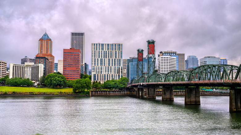 East side of Portland, Oregon, on a cloudy day with a bridge crossing the Willamette River.