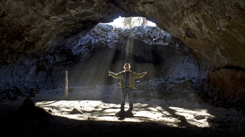 Man standing in cave