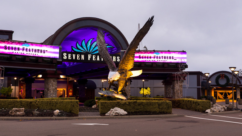 Outside entrance to Seven Feathers Casino Resort glows