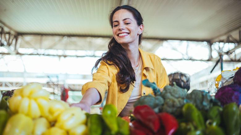 Woman buying produce at a farmer's market