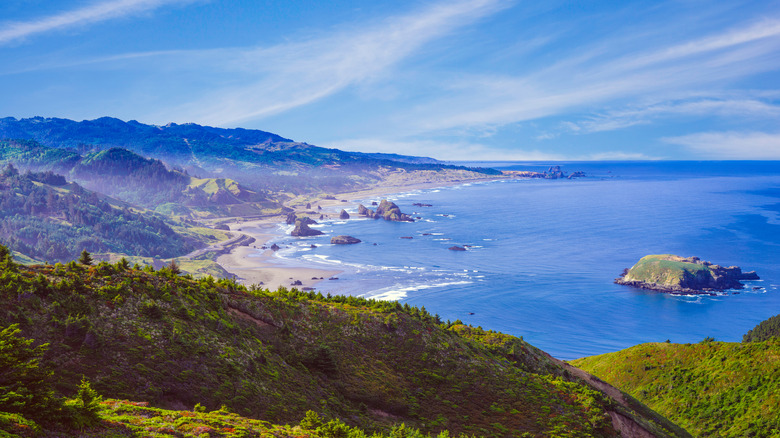 Hills rise behind the beaches of Cape Sebastian