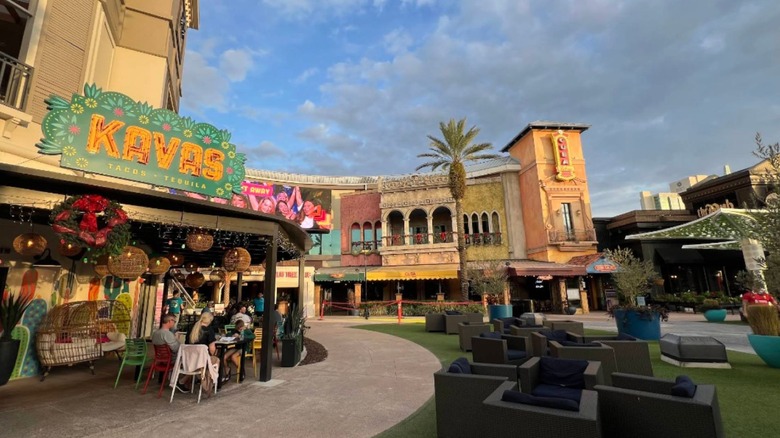 Exterior of Pointe Orlando with buildings and seats