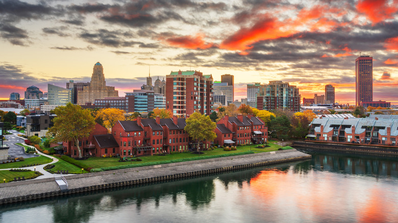 The skyline of Buffalo N.Y.  at sunset by a lake