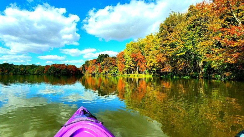 A kayak on the water in the fall at Stonelick Lake State Park in Ohio.
