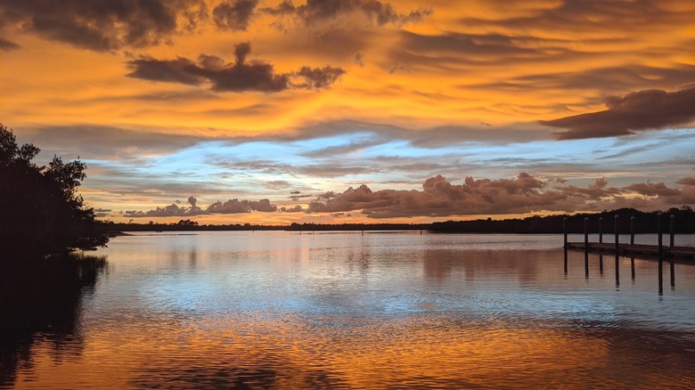 Sunset over the water as viewed from the Port Charlotte Beach Park in Charolette County, Florida