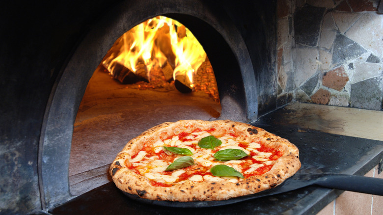 Handcrafted pizza fresh from the wood-burning oven