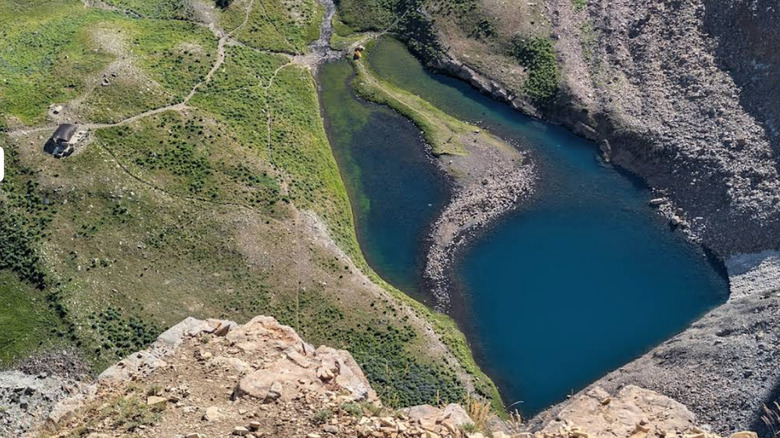 An aerial view of Emerald Lake from Mount Timpanogos