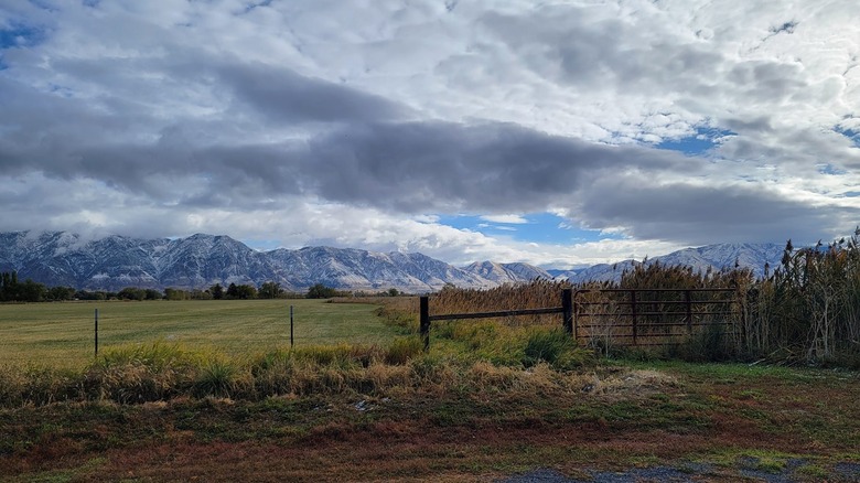 Mountains loom over Corinne, Utah