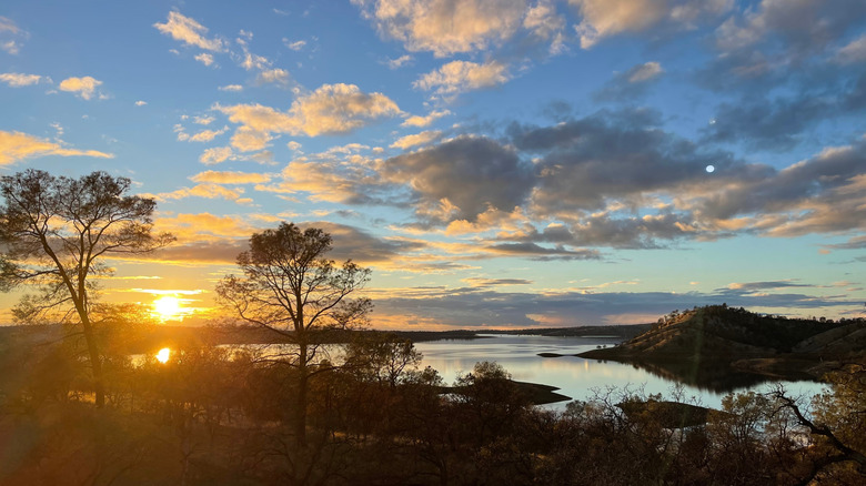 Sun setting over Don Pedro Lake.
