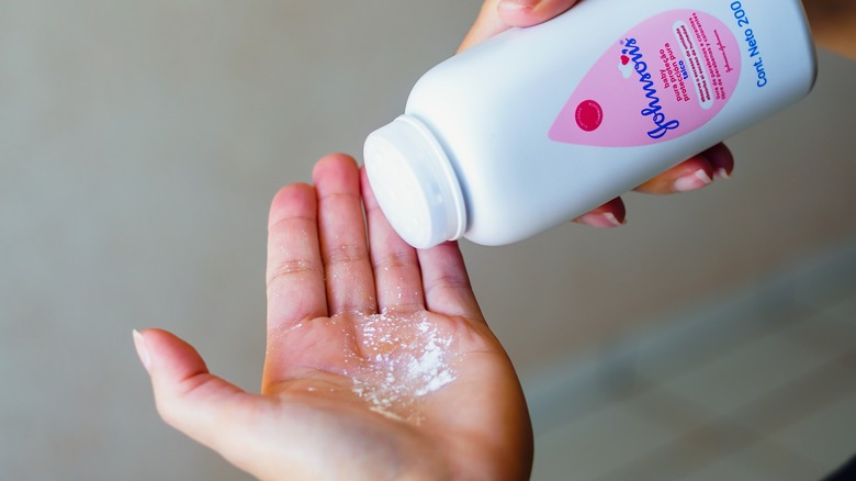 Baby powder in hand
