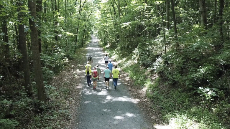 Hikers walk along a completed section of the Deep River Trail in North Carolina