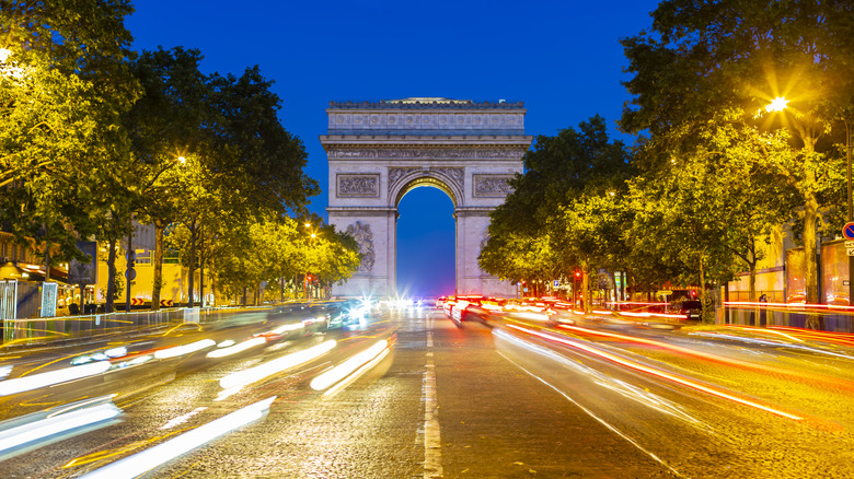 Evening view of the Arc de Triomphe in Paris, France