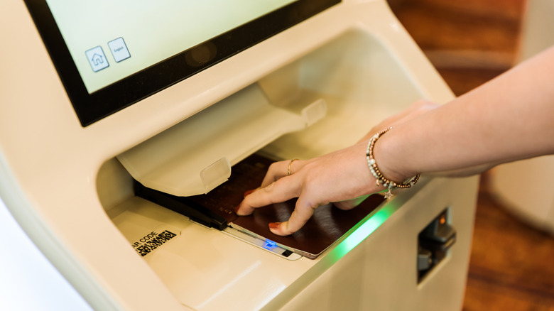 Self service passport scanner at the airport