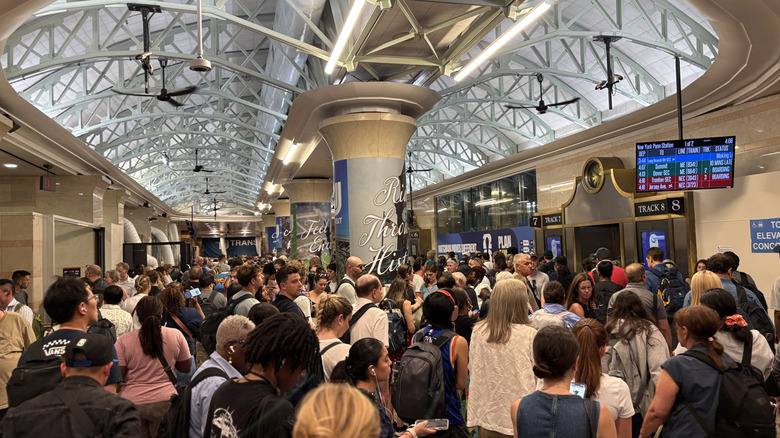 A crowd of travelers at Penn Station, New York