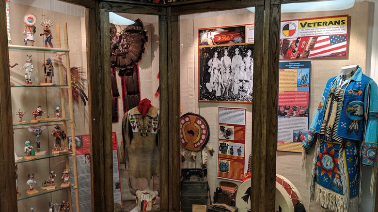 A display case of Native American artifacts at the Museum of Indian Culture in Allentown