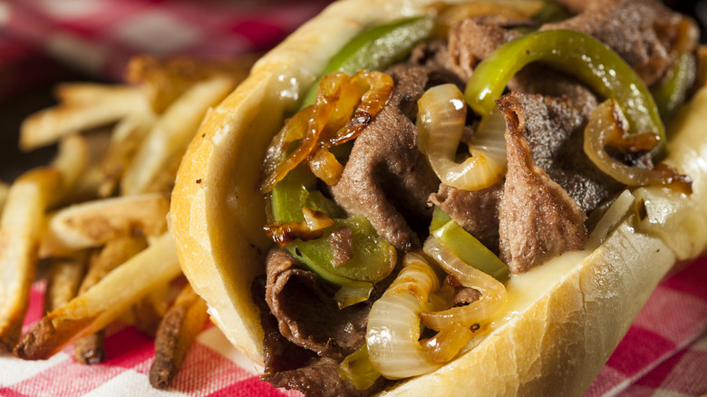 Close up of a Philly cheesesteak sandwich
